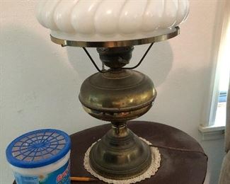 Old metal base lamp with swirl white glass shade