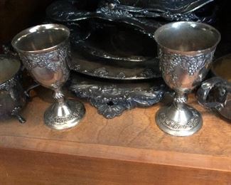 Silverplate serving pieces with grapes