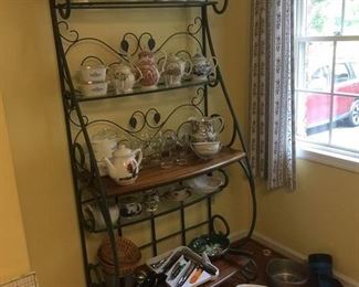 baker's shelf, pyrex, tea pots, cooking utensils, flashlight