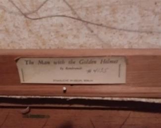 Man with the Golden Helmet museum tag