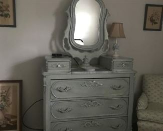 Antique, Victorian vintage wooden 3-drawer dresser with mirror.  Pale blue. Two top storage drawers. 9"x13"marble inlay on top. Very good condition. Measures 41" wide, 18 1/2" deep, 42" high. Mirror measure 26" high. Wheels on feet. Beautiful piece of furniture, very heavy. It's located on the second floor of a narrow staircase. 