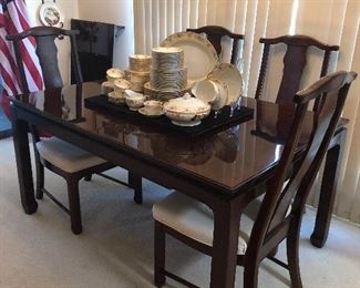Oriental style table w/6chairs
2 leaves and custom table pads