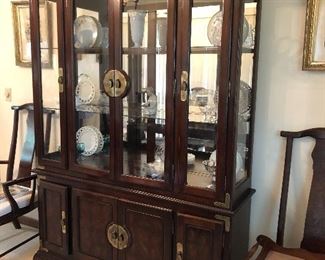 Oriental style lighted china cabinet