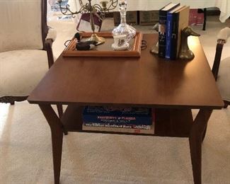 Mid century coffee table crystal decanter, brass candleholder,books and bookends