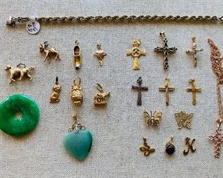 Gold charms and crosses