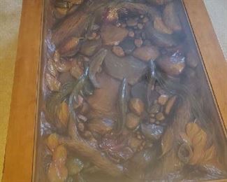 Not a good, this is wood carved life size fish and rocks as if it is a stream of fish,