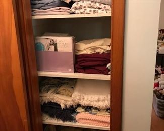 Linen closet full. This is only a sample of the many towels, blankets, sheets, etc. to be found.