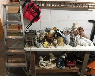 Ladder and more ceramic animal figurines.