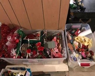 Tubs of holiday items to be sorted.