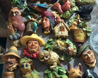 Collection of chalkware wall art.