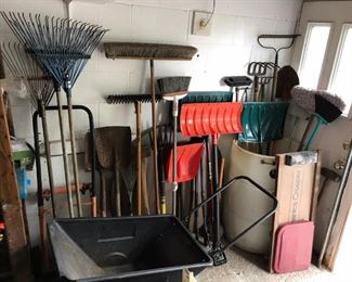 Many yard and garden tools.