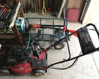 Toro GTS 5 lawn mower; metal wagon; lots of yard and garden.