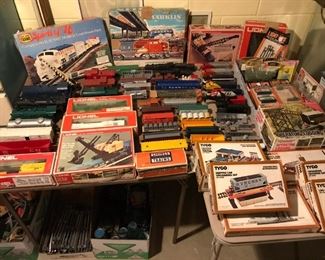 Large collection of model trains, including Lionel, Marklin and more. Close-up photos of these items, including a photo of additional model train components, can be seen below.