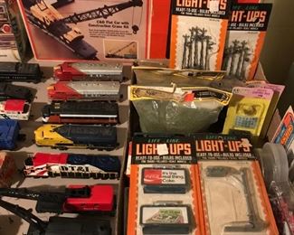 A closer look at some of the model trains and components, some in their original boxes.