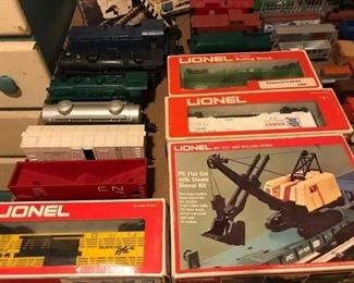 A closer look at some of the model trains and components, some in their original boxes.