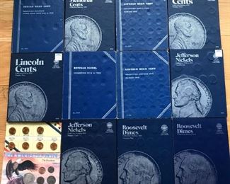Eleven coin albums and a couple of smaller sets. These coin albums do contain coins, some nearly full, and some with less than half full.