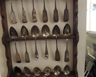 vintage spoon collection with display rack