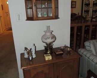 hanging curio with collections and record cabinet