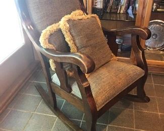 Unique rocker with upholstered seat and back.  