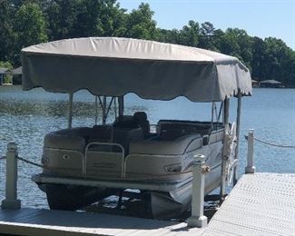 What would a lake house be without a boat?  2007 24’ Pontoon Boat with 90 horsepower engine.... excellent condition-just needs water pump.  Also available are boating accessories, a 50 gallon gas tank, five 5-gallon gas tanks, rope, & more.  