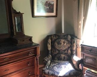 This bedroom suite has a four-drawer dresser with a mirror and jewelry cases.  Also included is a night table with drawer and shelf.  