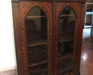 Inlaid display cabinet stand about 4 feet high.  