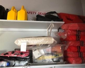 Life jackets, gas cans, rope, other boating supplies.  