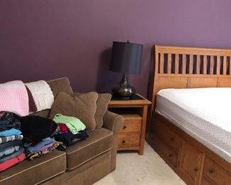 Bedroom has king bed with platform with many drawers , pair of nightstands, great dresser with mirror. All furniture is 6 months to 4 years old 