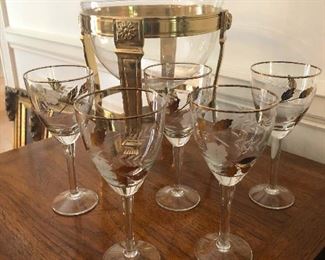 fancy gold guilted wine glasses and ice bucket -- Zsa Zsa Gabor