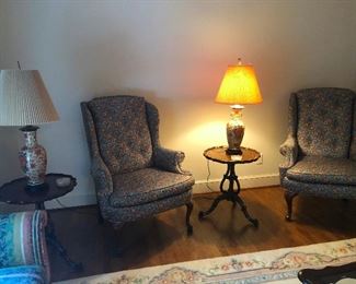 Two invisible people sitting in armchairs