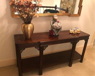 parlor table holding my favorite ceramic monkey