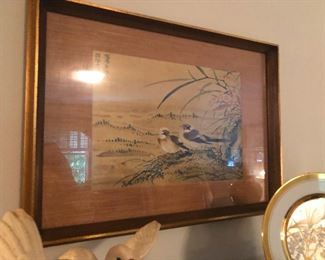 picture of two birds discussing the best way to inform the kids of their impending divorce