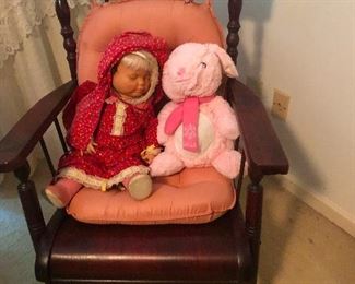 creepy 3-faced doll and pink elephant