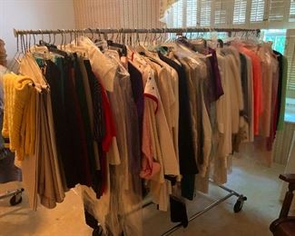 lots of big-shoulder 80s Dynasty sweaters 