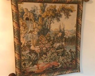 large hanging tapestry depicting Grecian garden, wood nymphs and minotaurs (you have to look closely)