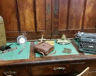 Vintage desk top items, with a huge antique desk