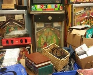 guy stuff! pinball machines, record players, bins of cd's cassettes and 8 tracks