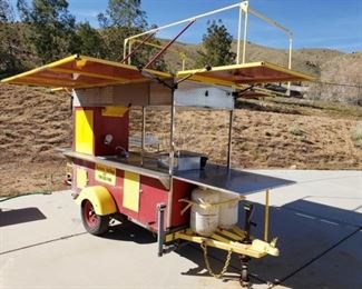 #600: Hot Dog Cart
Hot Dog Cart 14ft×11ft, 9ft 9in Tall, Triple Sink, Drink Refrigerators, Condiment Trays, Hot Dog Trays and Food Storage Containers, Sun Shades, Tow Hitch, Propane Tanks, Wash Sink, Snack Shelves
PTI plates. 
DMV fees: $50 and $70 doc fees 
