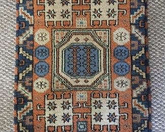 Caucasian rug. Approximately 2’ x 3’.