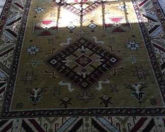 Kazak rug. Approximately 5 feet 9” x 8’.