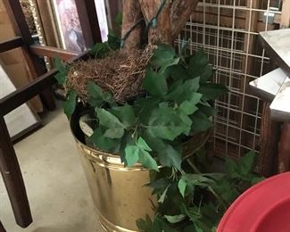 Brass pot with fraudulent flora.