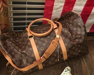We believe this one to be "faux". It's not bad, but the piping and fabric thickness are not quite at authentic luxury levels in our opinion.