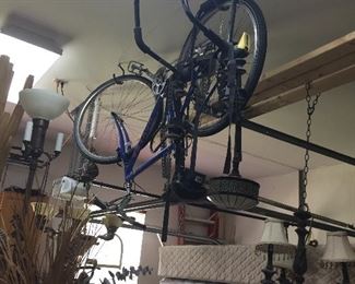 bike, and chandelier and mattress sets