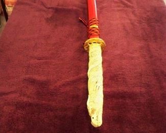 Duncan MacLeod Dragon Head Katana with red scabbard, 41" overall length.