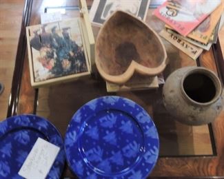 Carved bowls, old Playboy, Starbucks Chargers