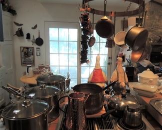 Copper pots and pans and utensils. Copper hanging pot rack. Extra large pots