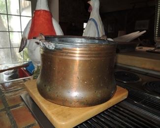 Copper pots and pans and utensils. Copper hanging pot rack