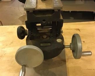 Adjustable Base for a Surveying Telescope