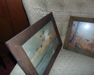 Collection of wildlife prints framed with barn wood frames