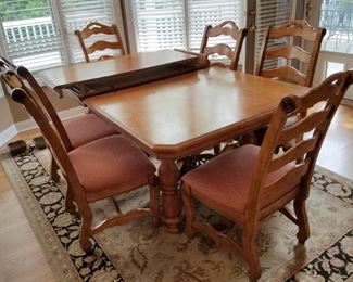 Gorgeous solid wood kitchen or dining room table with six chairs